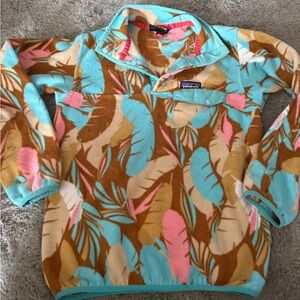 Patagonia Synchilla Fleece in Pink, Blue, and Brown